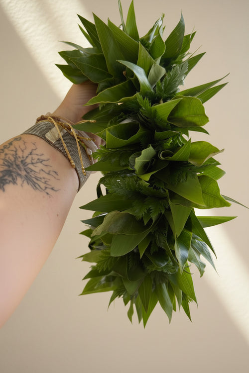 all foliage flower crown created with different types of tropical foliages and ferns 